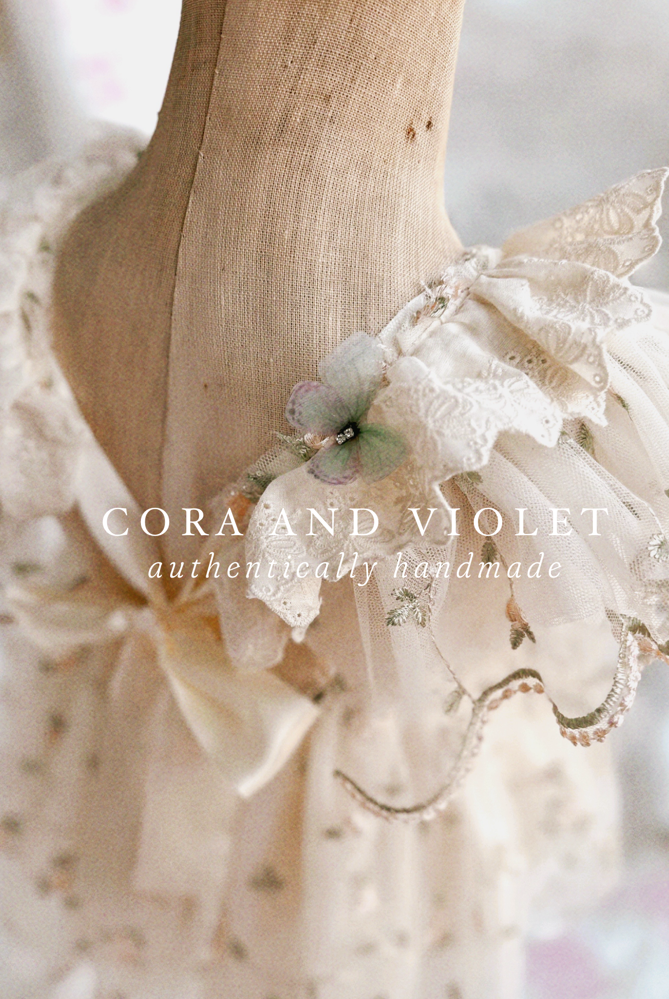 Rear view of the Winnie Heirloom dress showing adjustable straps and flexible waist for a long-lasting heirloom fit. 3d butterfly details handmade baby first birthday dress