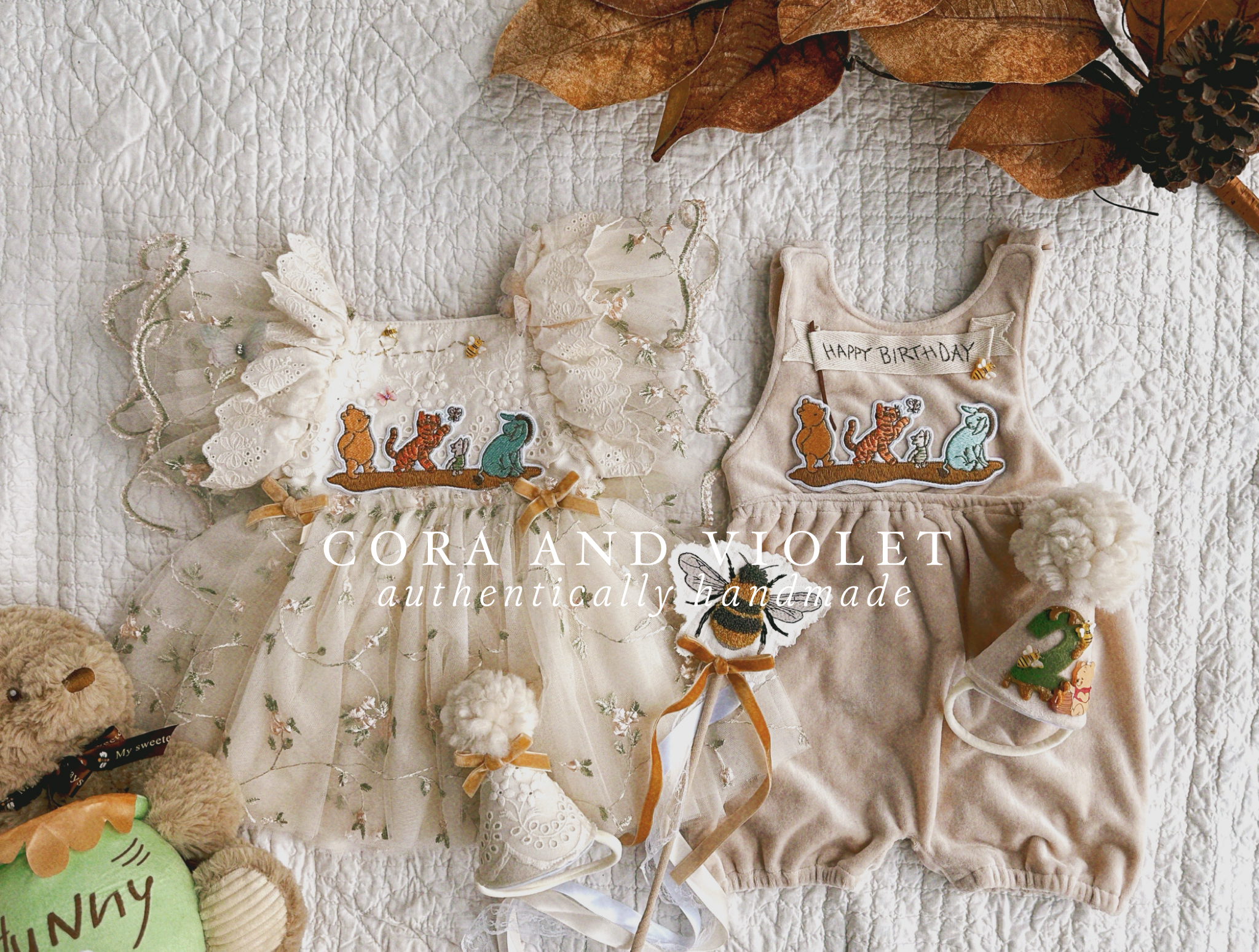 The Winnie Heirloom by Cora and Violet, a handmade Winnie the Pooh inspired birthday dress with 3D butterfly and honey bee embroidery. bow girl twin set boy winnie romper