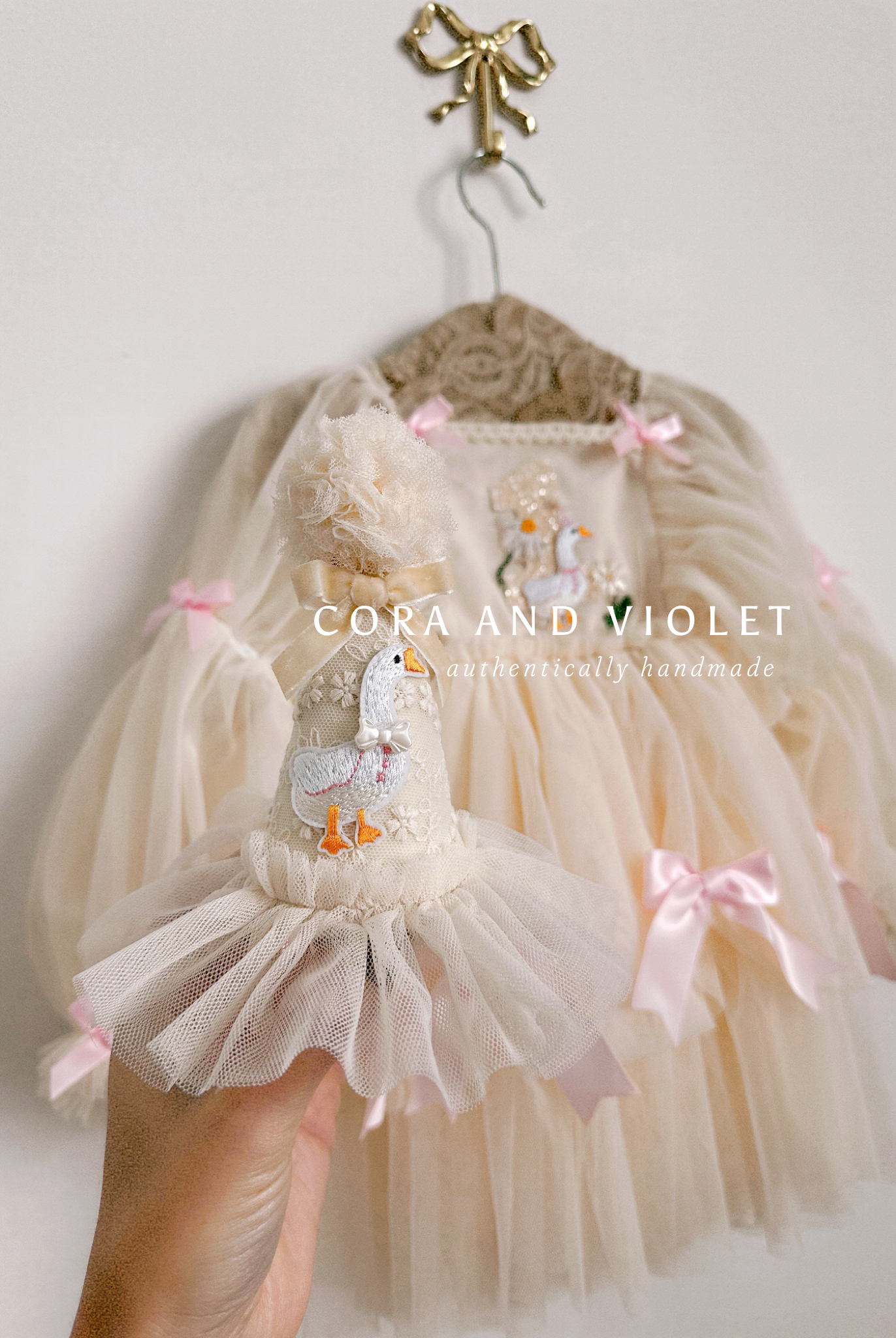 Hand-stitched luxury Silly Goose birthday dress for toddlers, featuring artisanal embroidery and heirloom construction by Cora and Violet.