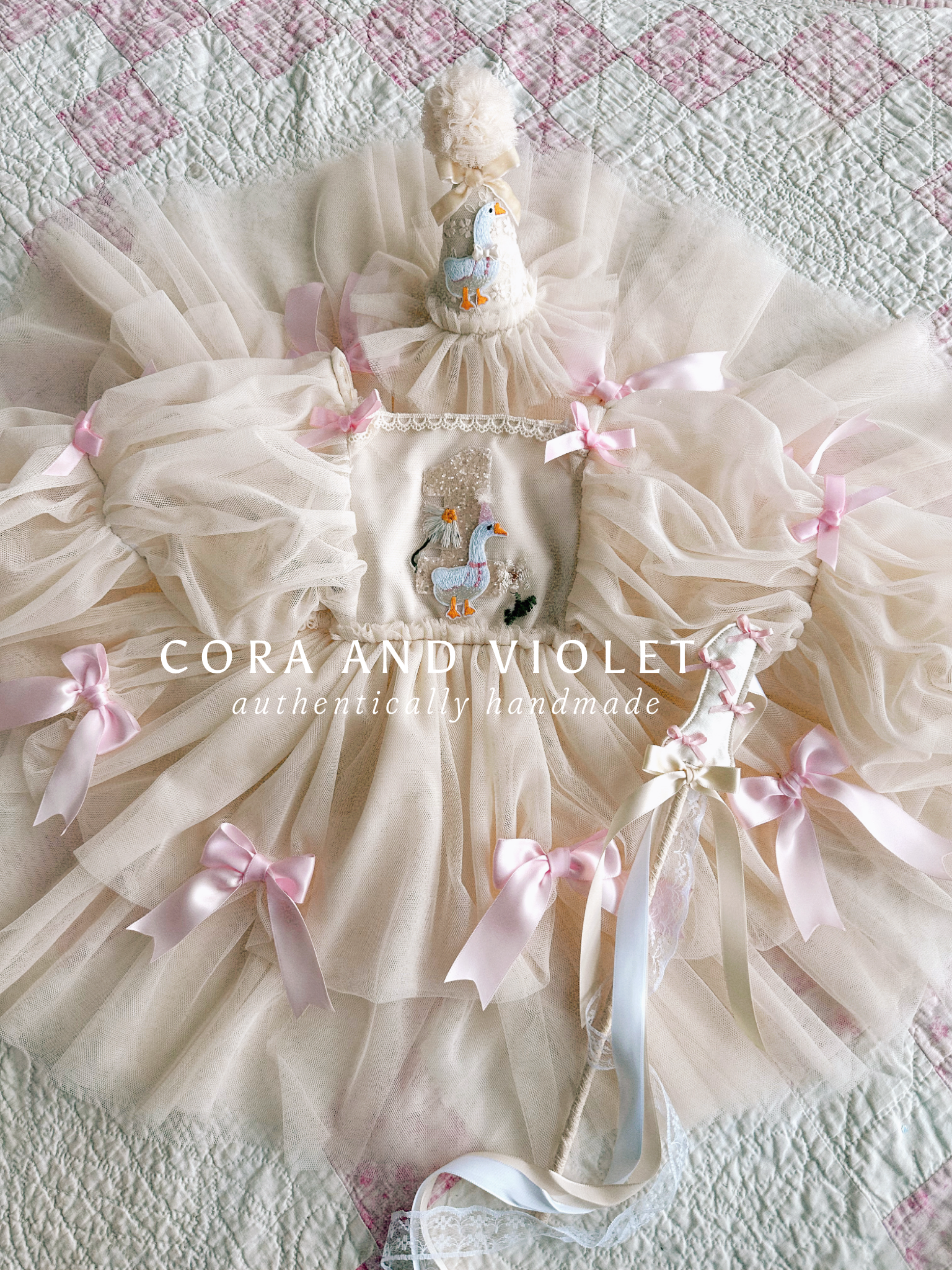 Hand-stitched luxury Silly Goose birthday dress for toddlers, featuring artisanal embroidery and heirloom construction by Cora and Violet.