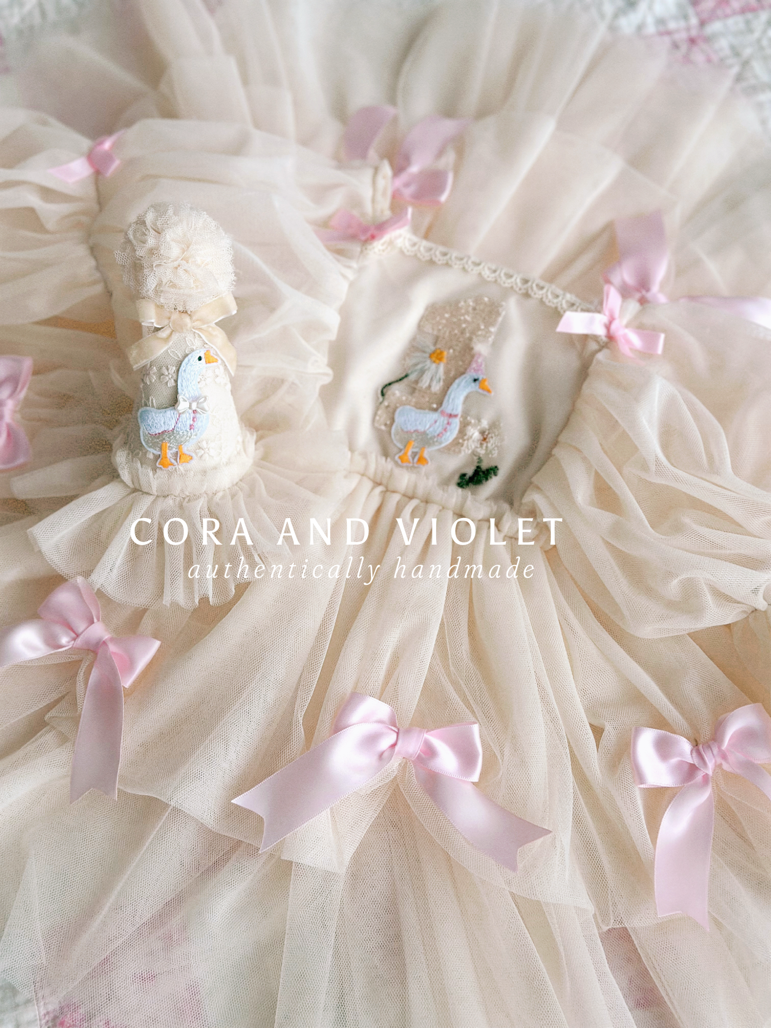 Hand-stitched luxury Silly Goose birthday dress for toddlers, featuring artisanal embroidery and heirloom construction by Cora and Violet.