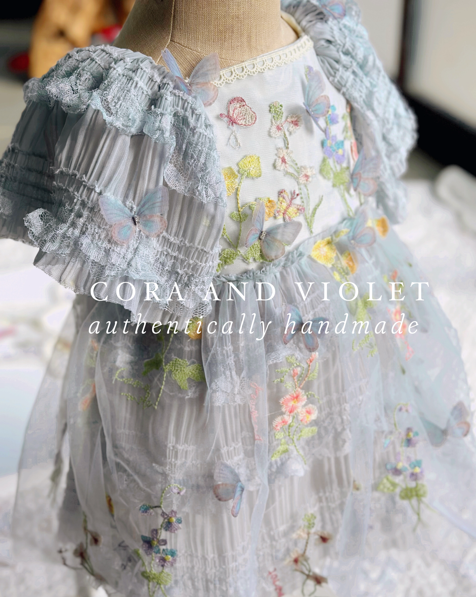 The Marlowe 3D Butterfly & Wildflower Gown // Pale Blue Heirloom Miles Cora and Violet The Marlowe 3D Butterfly & Wildflower Gown // Pale Blue Heirloom Miles Cora and Violet