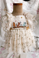 Rear view of the Winnie Heirloom dress showing adjustable straps and flexible waist for a long-lasting heirloom fit. mannequin fit adjustable shown size