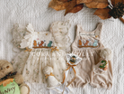 The Winnie Heirloom by Cora and Violet, a handmade Winnie the Pooh inspired birthday dress with 3D butterfly and honey bee embroidery. bow girl twin set boy winnie romper 