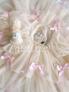 Hand-stitched luxury Silly Goose birthday dress for toddlers, featuring artisanal embroidery and heirloom construction by Cora and Violet.